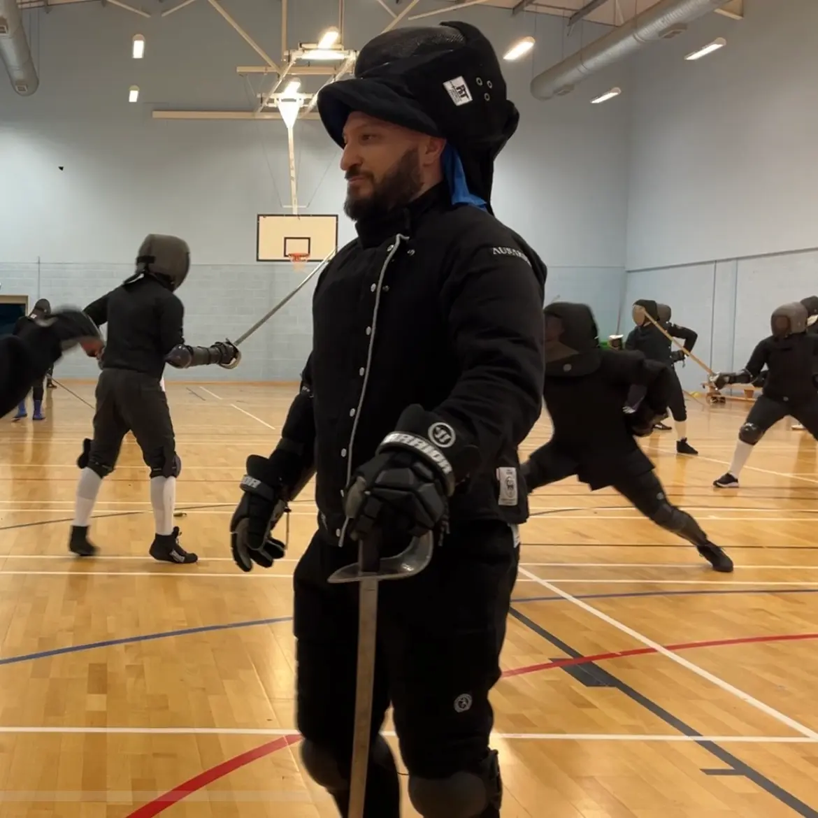 Olgun Tiltay practicing military sabre - HEMA